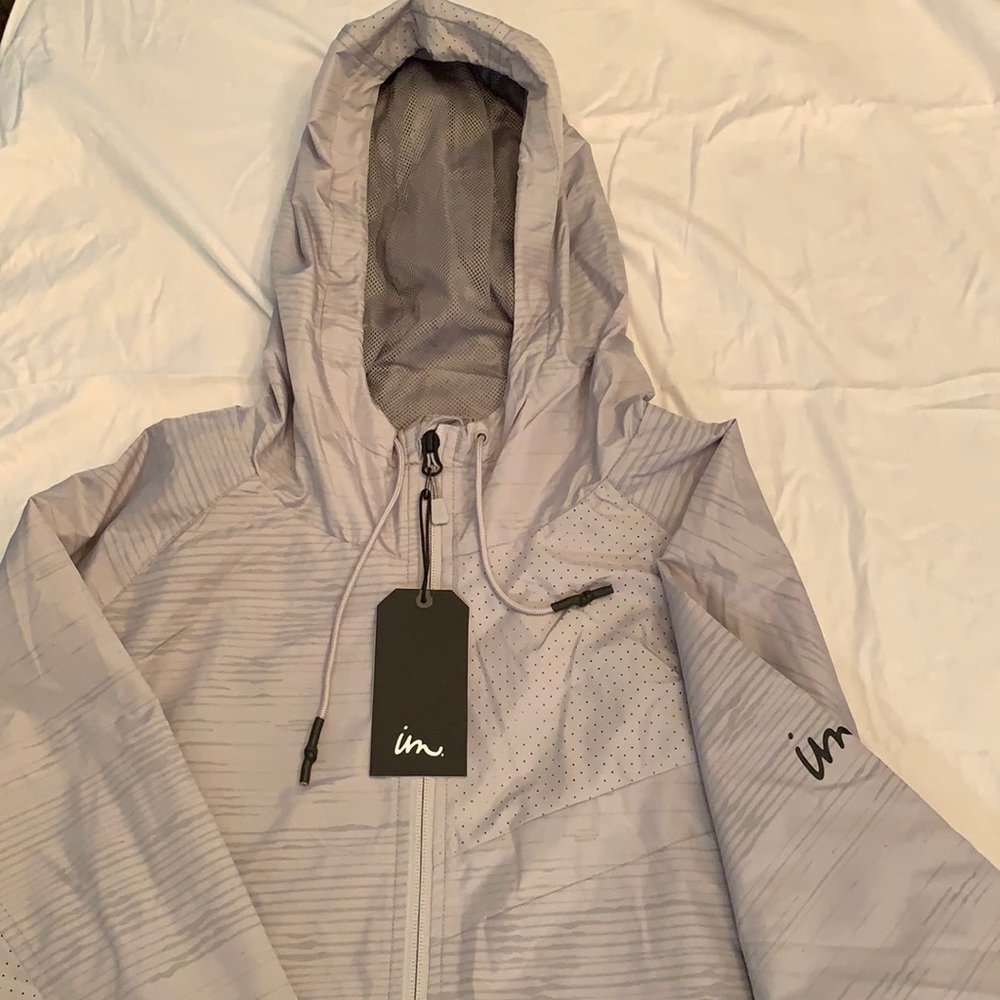 Imperial Motion. Grey, full zip windbreaker.